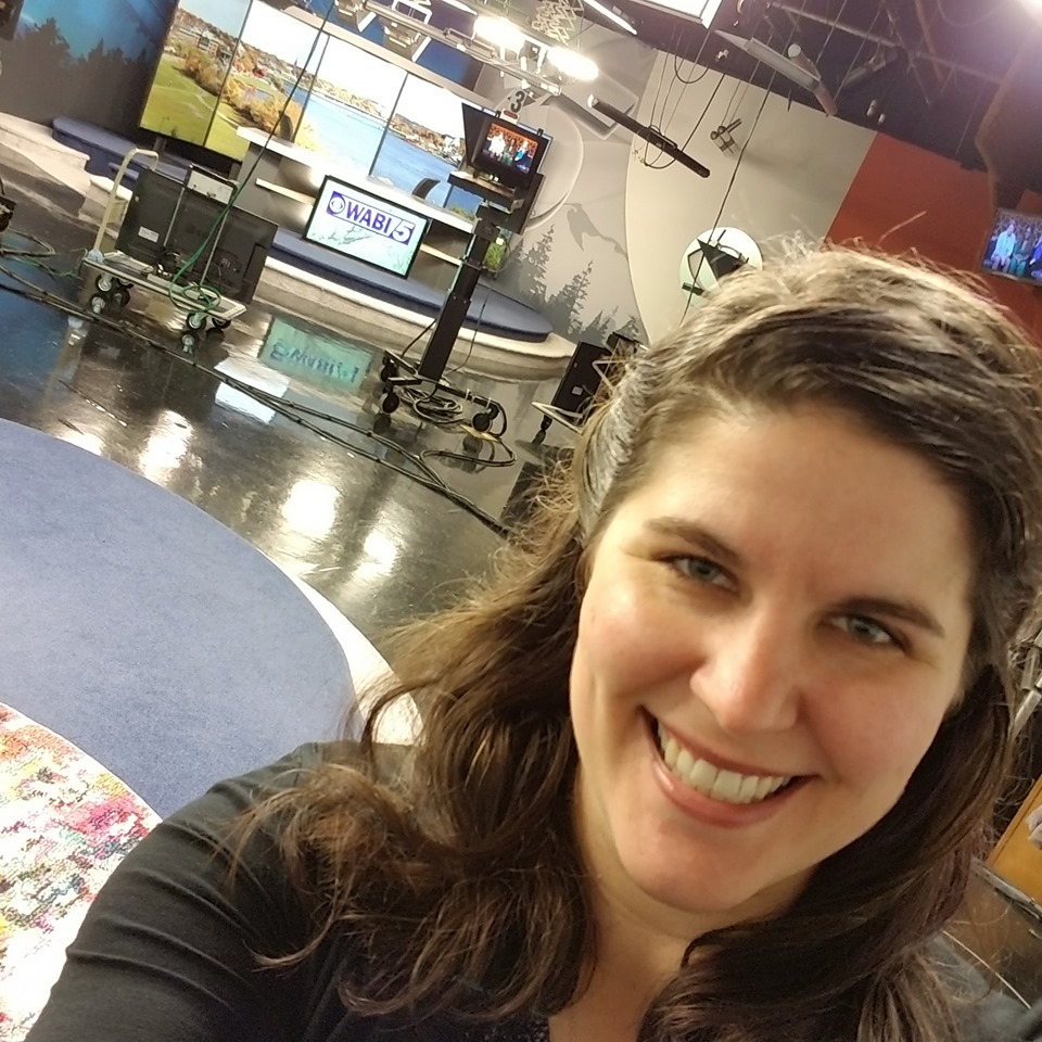 Emma G. Rose on a television news set